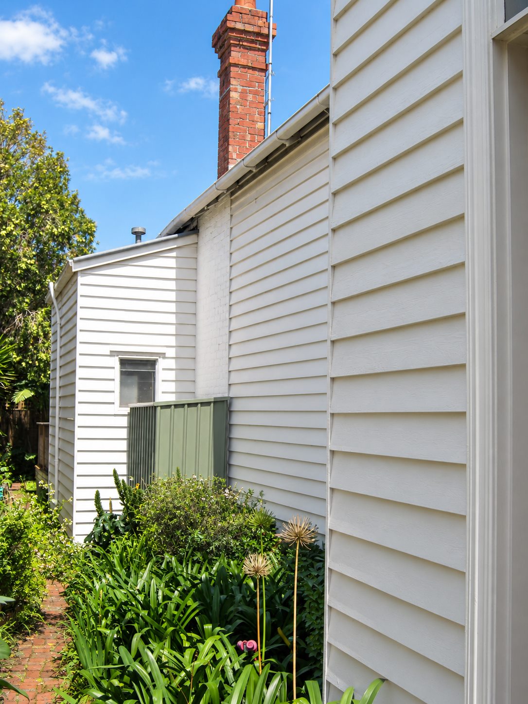 Down the side of the cottage towards the garden the addition opens onto